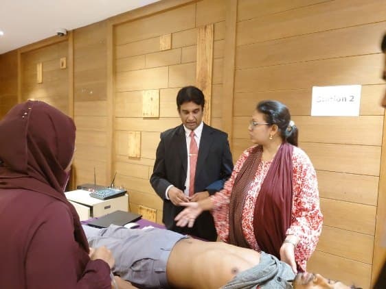 Dr. Chakraborty leading a bedside clinical demonstration