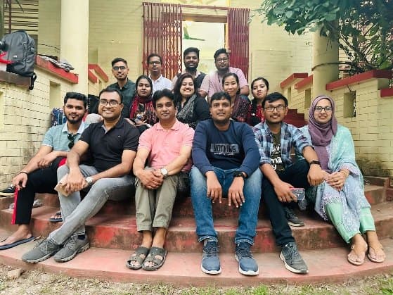 With the young volunteers who run the camps